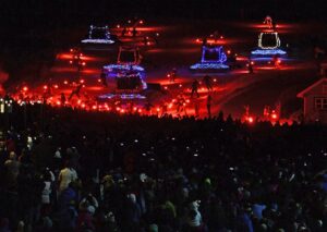 Snow cats lit up for new years